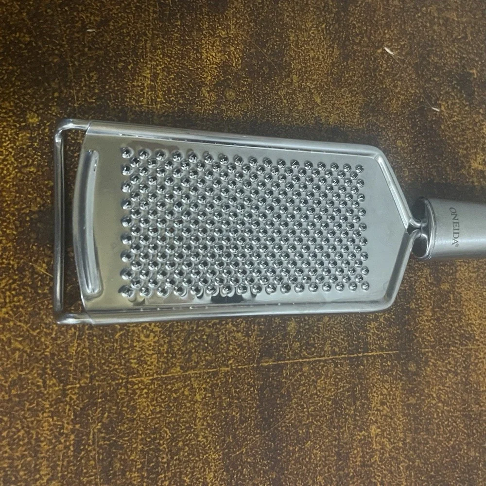 Oneida Stainless Steel Hand Grater/ Zester with Hand Grip and Pot Hook.